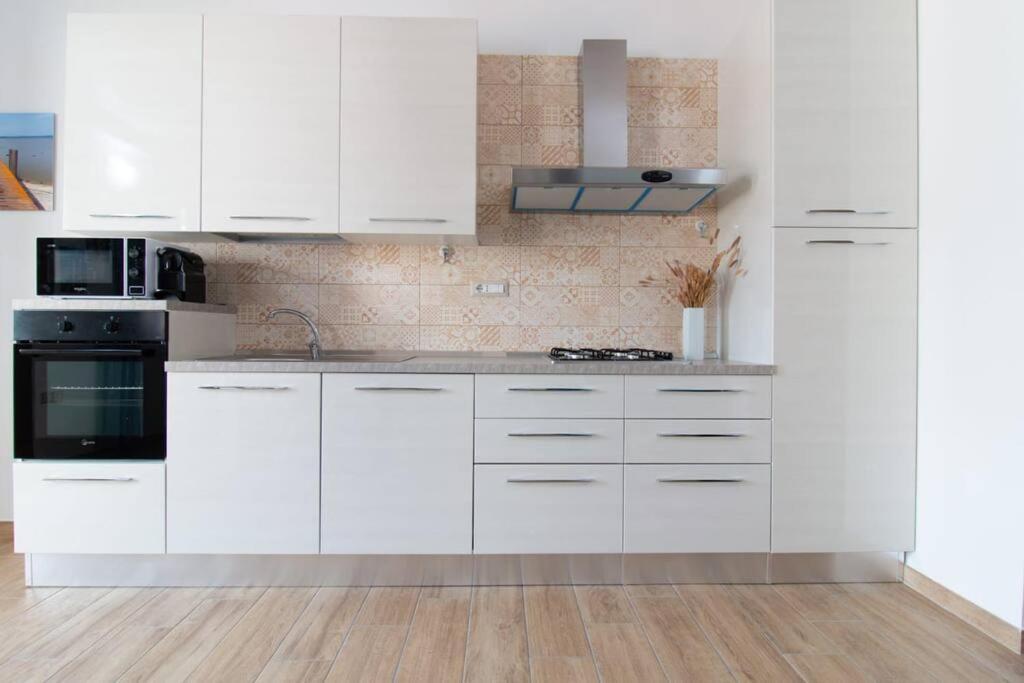 Appartement Il Guardiano Del Faro à Càbras Extérieur photo